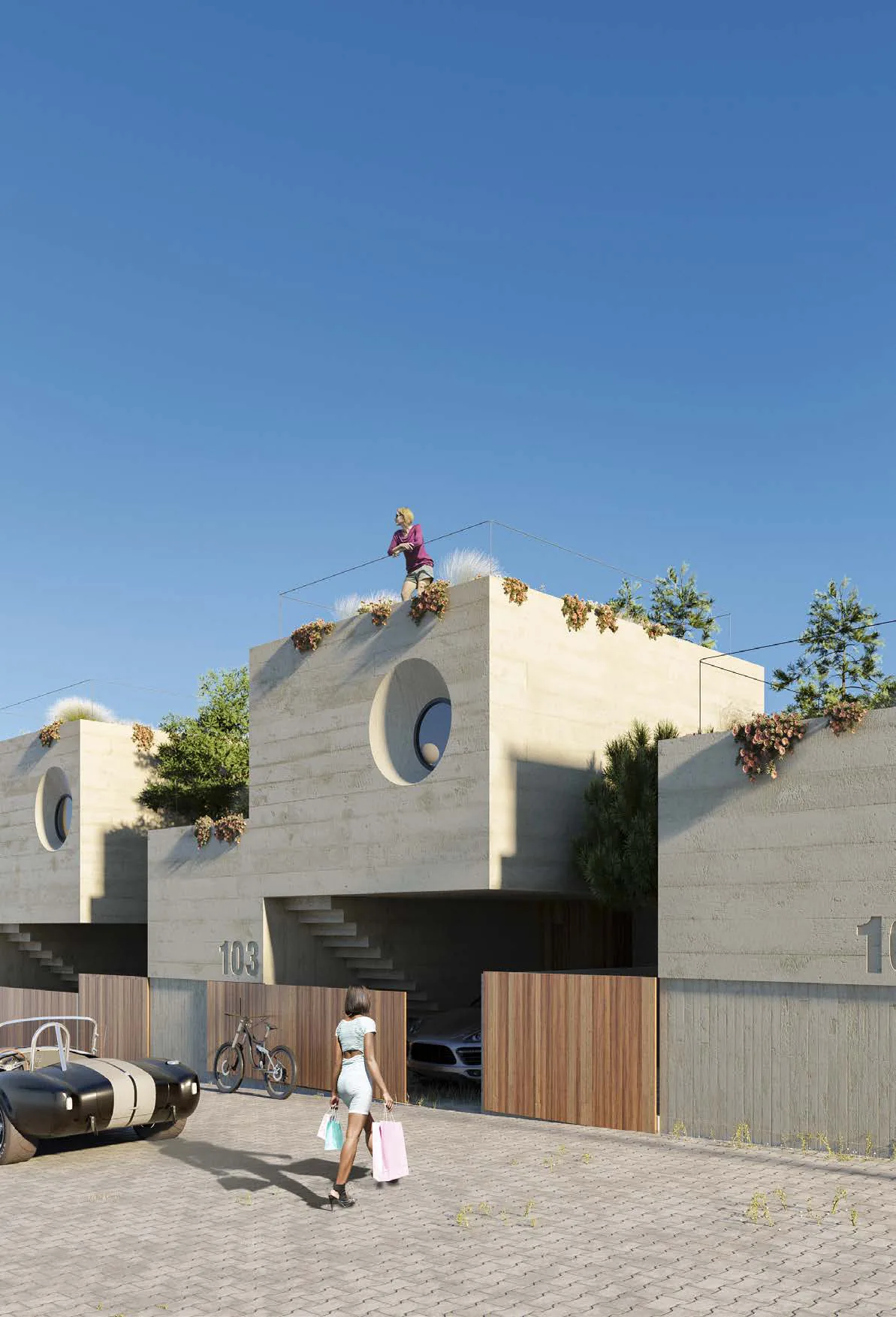 Front façade of a Pine Tree villa in board-formed concrete with an arched window